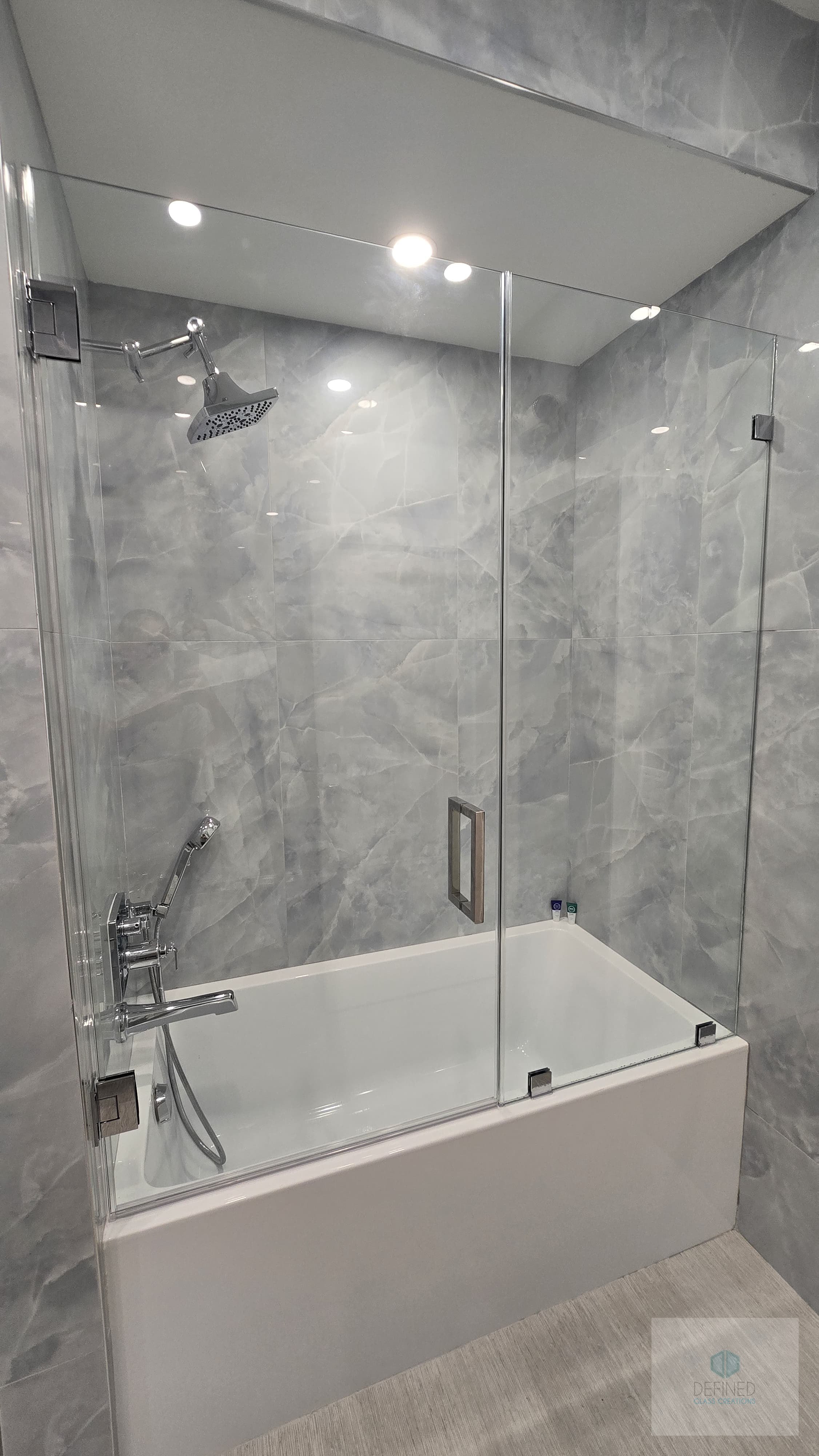 Hinged glass shower door
